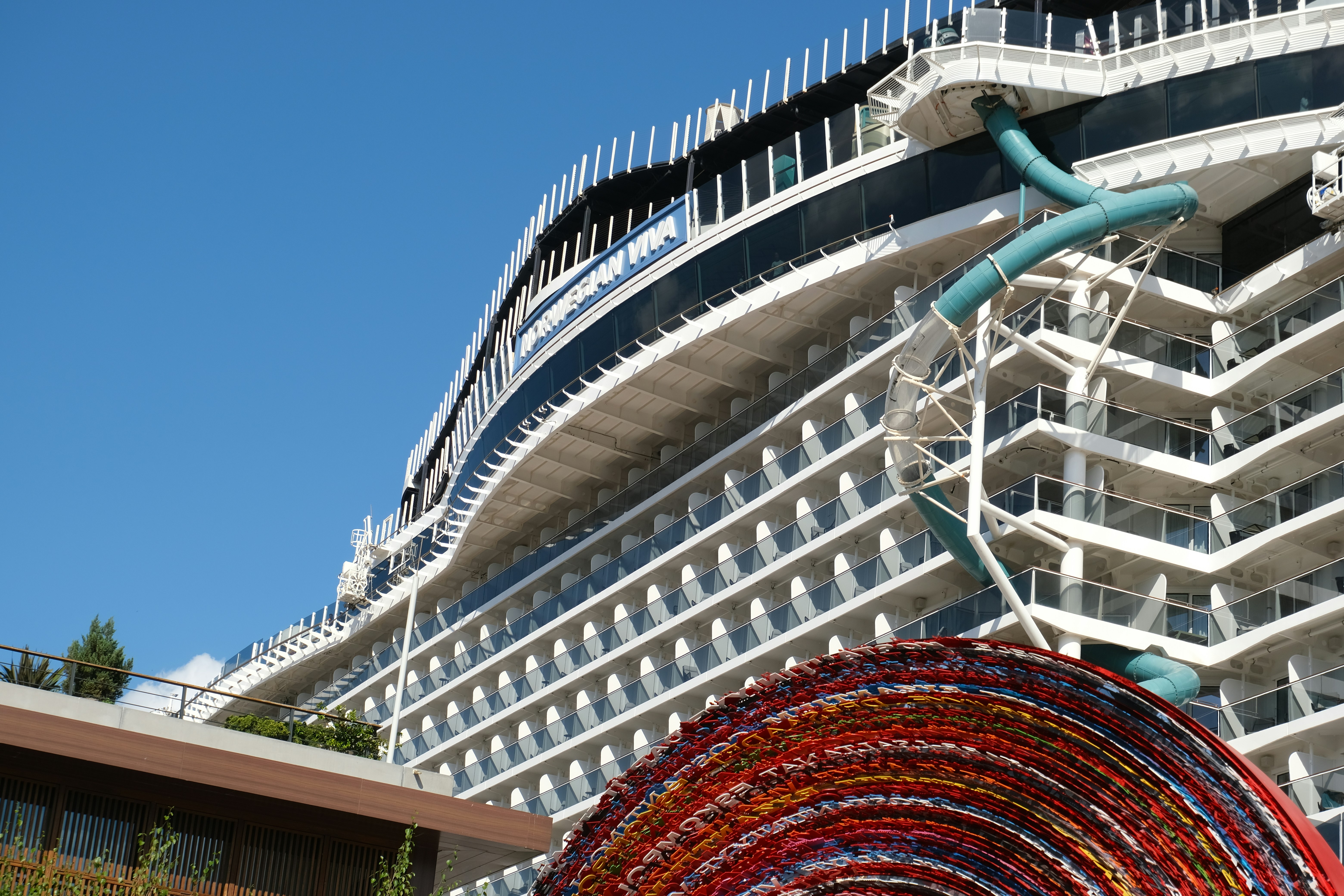 Giant cruise ship with colorful waterslides at sea - Istanbul harbor